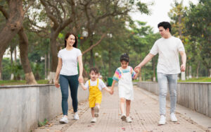 Young Asian family in the park